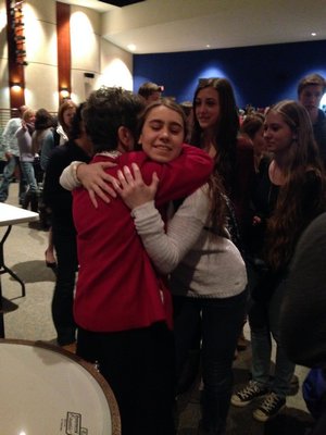 Lauren Capozzola, 16, hugs Bozenna Urbanowicz Gilbride, a Polish Holocaust survivor, after hearing her presentation at the Westhampton Beach High School on Tuesday. BY CAROL MORAN
