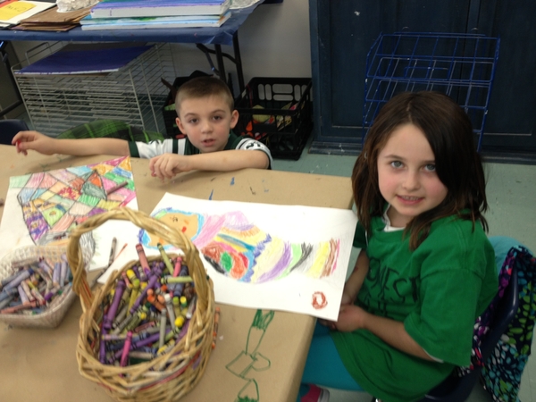 First graders Brett Ruffo and Lexi DeRose wear green for Sandy Hook Elementary students. ERIN MCKINLEY