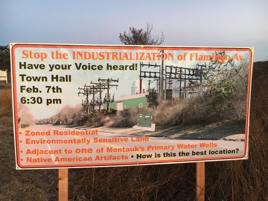 A billboard put up near downtown Montauk this week presented a digitally altered image of an imagined new substation on Flamingo Avenue  that officials say is not accurate. MICHAEL WRIGHT