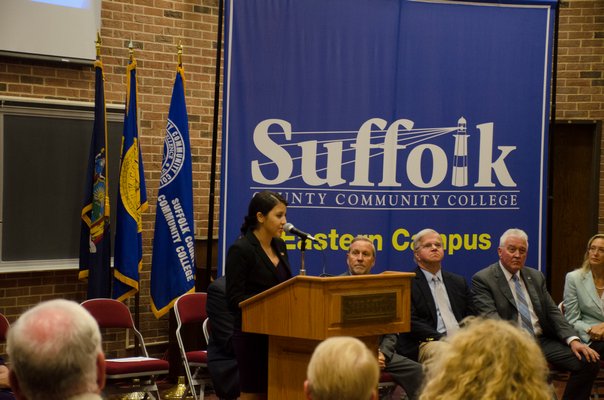 Student Trustee Maria Gomez speaks at a groundbreaking ceremony for a new athletic facility that will be located at the Suffolk County Community College Eastern Campus in Northampton on Monday. GREG WEHNER
