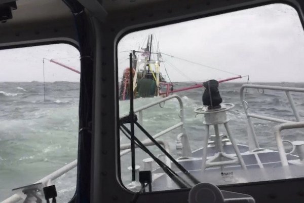 A photo of the All For Joy taken by a U.S. Coast Guard crew that followed the Hampton Bays fishing boat while it tried to overcome flooding in one of its fish holds on Sunday morning. The vessel ultimately capsized near Fishers Island its crew was rescued by the Coast Guard, uninjured.Courtesy USCG Courtesy USCG