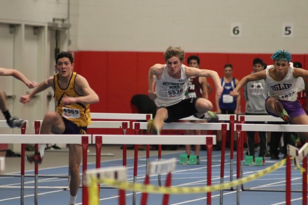 Jack Miegel of Westhampton Beach placed third in the 55-meter hurdles but also won the high jump.