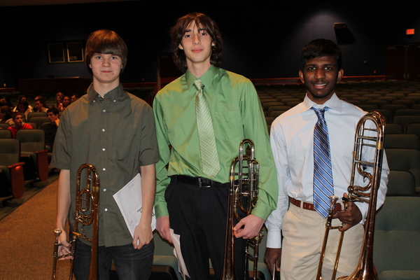 Westhampton Beach juniors Bobby Rice, Dan Grindle and senior Subi Chockalingam performed "Give Us Peace" composed by Michael Praetorius at the Solar Energy Project Ribbon Cutting Ceremony.  LOREN CHRISTIE