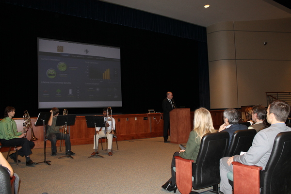 Westhampton Beach Schools Superintendent Michael Radday introduced the student trombone trio, who performed at the Solar Energy Project Ribbon Cutting Ceremony.  LOREN CHRISTIE