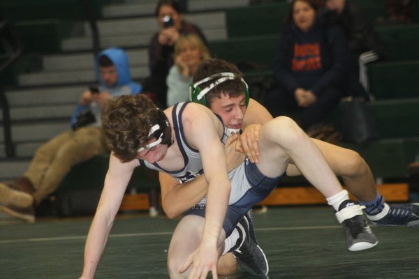 Westhampton Beach sophomore Jack Santora earned a 7-5 win over Rocky Point's Matt Sloan at 106 pounds on Friday, and then had the match-clinching pin in a win over Newfield during the Cory Hubbard Duals, hosted by his team on Saturday. CAILIN RILEY