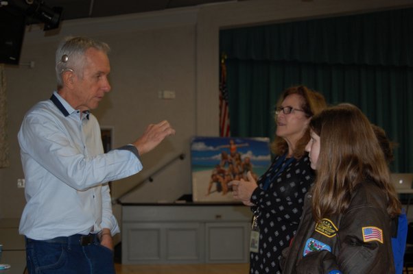 Artist Charles Wildbank talking to students and staff of Our Lady of the Hamptons Regional Catholic School. JON WINKLER