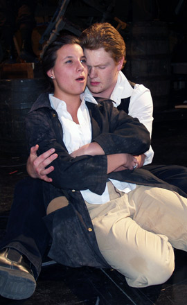 Andrew Kohn, 18, holds Taylor Sorice, 18, as her character dies from a gunshot wound during a rehearsal of “Les Miserables,” which will be performed at Eastport South Manor Junior-Senior High School this weekend. JENNETT MERIDEN RUSSELL