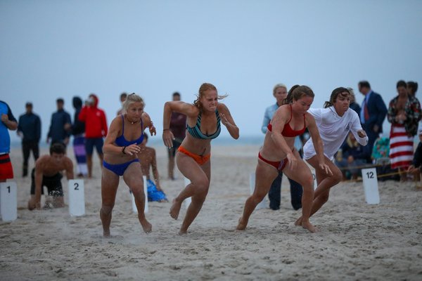 Sarah Culver (red suit) won the female beach flags competition.