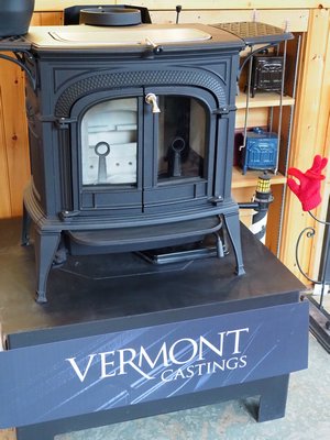 This Vermont Castings wood stove puts out 37,000 BTUs at 77 percent efficiency and already meets the 2020 EPA emission standards. Great for a small house, cabin or large room. The ash pan under the stove makes cleaning real easy and the griddle top can be used for cooking or heating food. Cost is around $2,200 plus installation. ANDREW MESSINGER