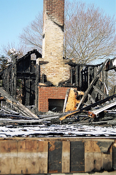 A flue fire ripped through a home on Godfrey Lane in Remsenburg in 2005. COURTESY JOHN RANKIN