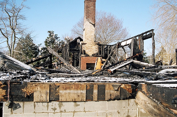 A flue fire ripped through a home on Godfrey Lane in Remsenburg in 2005. COURTESY JOHN RANKIN