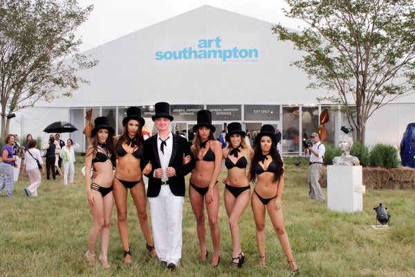Artist Kevin Berlin and his top hatted entourage TOM KOCHIE