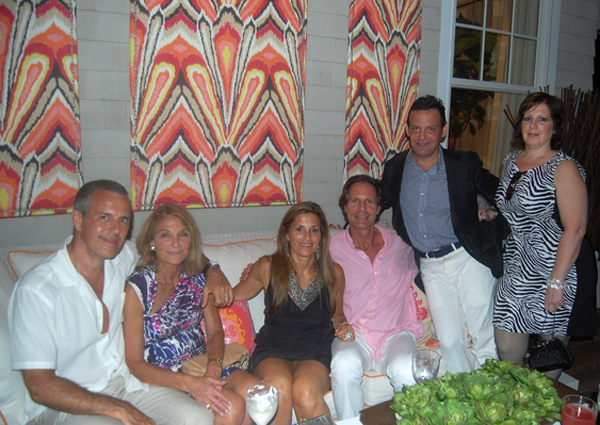 Steve Miller, left, Barbara Levy, Lauren Witkoff, William Wolff, Jack Levy and Sharon Tintner enjoy the party on one of the Showhouse's many porches.