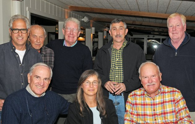 The Montauk Fire Department held its Annual Old-Timers Dinner on Tuesday, November 17, at Harvest on Fort Pond in Montauk. The Dinner celebrated the life-long commitment of the members. Left to right are: Tom Grenci, Jr., Joe Perrella, Richard Monahan, Jim Grimes, Kevin Reilly; (front row) Rich Schoen, Jeanine Miedzwiecki and Herb Herbert. RICHARD LEWIN
