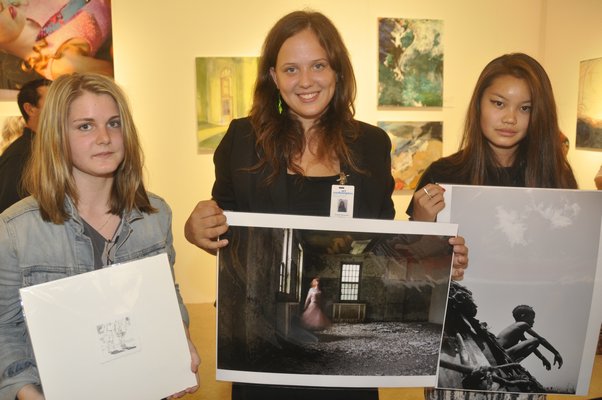 Ross School student artists Issy Cassou, left, Graylen Gatewood and Geige Silver. MICHELLE TRAURING