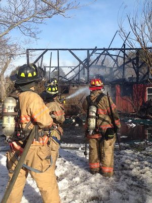 What was arguably the oldest standing barn in Southampton Village, located at 88 North Main Street, was destryoed in a fire on February 13.  COURTESAY SOUTHAMPTON FIRE DEPARTMENT