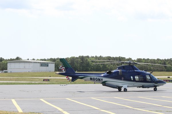 East Hampton Town is in talks with the estate of the late Ben Krupinski to buy out the lease on the East Hampton Executive Terminal hangar at East Hampton Airport.