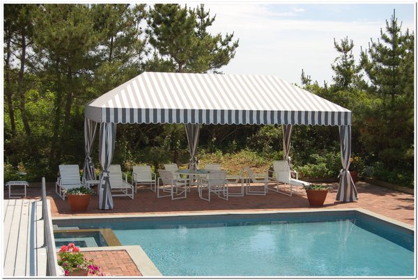 C.E. King of East Hampton offers a variety of awning options including stand-alone awning sets ideal for poolside lounge areas. COURTESY C.E. KING