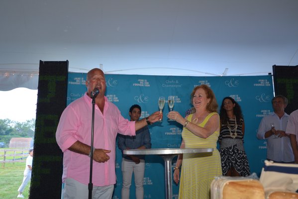 The guest of honor Andrew Zimmern, and The James Beard Foundation President Susan Ungaro toast after Mr. Zimmern's speech. ALEX GOETZFRIED