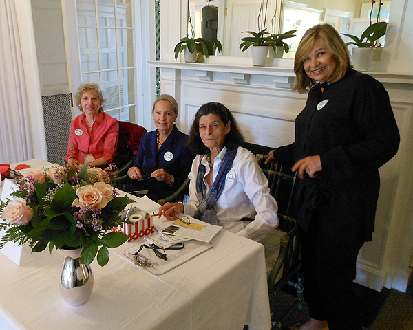 Madeline Preverte, Dozie Sheehan, Nancy Rollins and Raya Keis Knight at the check-in table.   HAL GOLDBERG