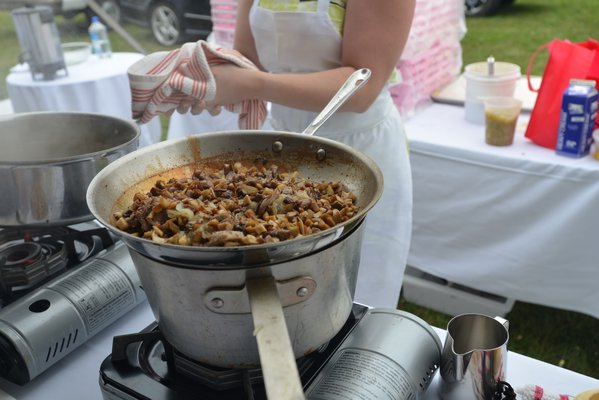 Mushrooms, foie gras, and duck meatballs getting cooked up by D'Artagnon at the Chefs Dinner. ALEX GOETZFRIED