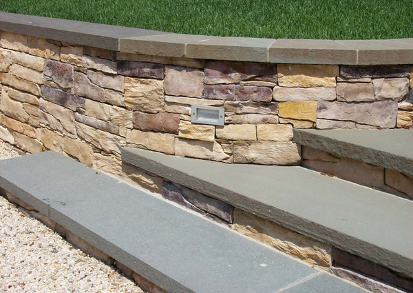 Cultured stone, or faux stone, gives the look of genuine material at an occasionally lower cost.
