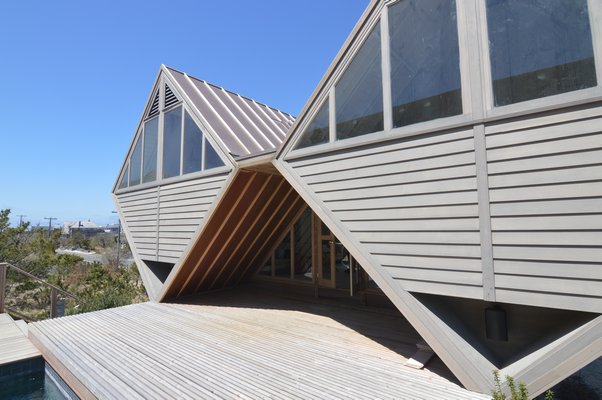 The new copper roof of the Double Diamond house was originally specified in Andrew Geller's specs, but shelved due to cost. This view shows the original front entrance. CHRIS ARNOLD