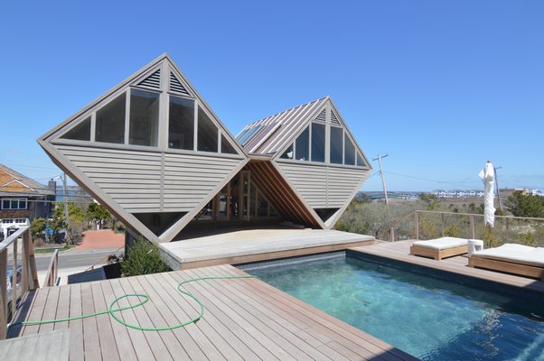 The "Double Diamond" Pearlroth house is now connected to the main house via this pool deck, all stained to match. CHRIS ARNOLD