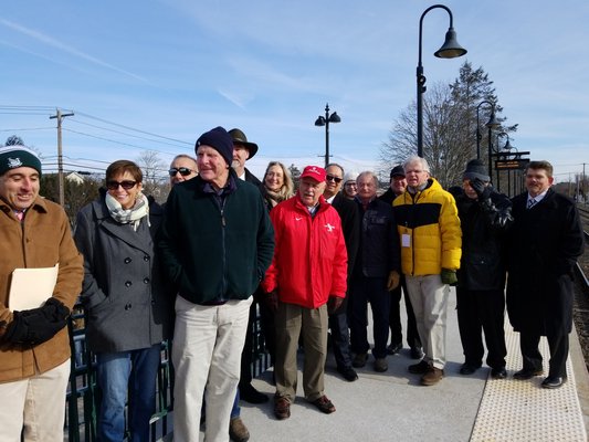 State and local officials met with Long Island Rail Road officials at the Hampton Bays train station on Friday to announce March 4 as the official start date of the South Fork Commuter Connection. GREG WEHNER