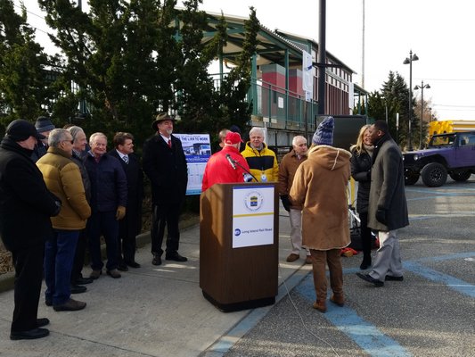 State and local officials met with Long Island Rail Road officials at the Hampton Bays train station on Friday to announce March 4 as the official start date of the South Fork Commuter Connection. GREG WEHNER