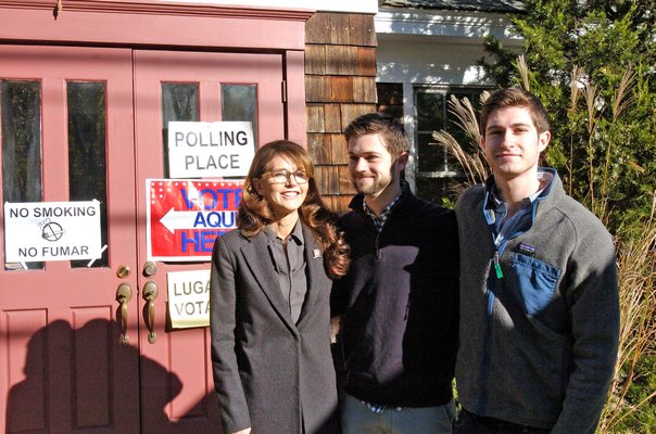 First Congressional District Democratic candidate Anna Throne-Holst heads into the Community Bible Church of Sag Harbor with her sons Max and Sebastian to cast her vote on Election Day.  DANA SHAW