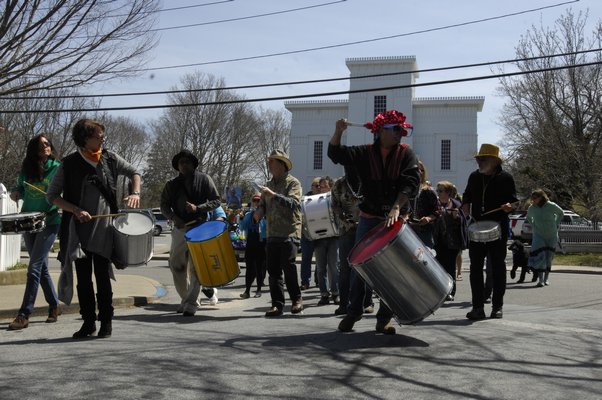 April 24 -- A gathering and a stroll was held through Sag Harbor in honor of Vivian Walsh of Vivian and the Merrymakers, who passed away earlier in the month. About 30 people including members of Escola de Samba Boom participated in the celebration.