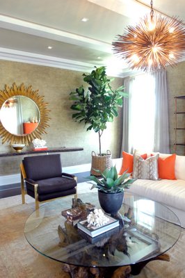 July 16 -- Fun—animal prints, vintage photos, bold light fixtures, orange for pop and flecks for sparkleis all the rage in luxury vacation home design this year, if the annual Hampton Designer Showhouse is any indication. The showhouse highlights the work of more than 20 local and far-flung interior designers. Set in an large new shingle-style home built by Parmount Homes of the Hamptons at 408 Pauls Lane in Bridgehampton, it opens July 20 and can be seen each day until September 1 for $35, which benefits Southampton Hospital.