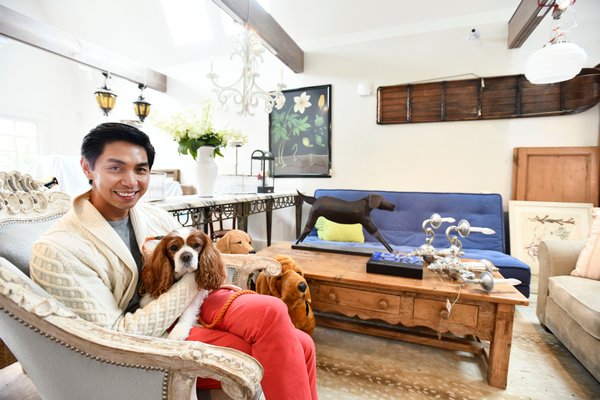 Blue Carreon with his dog, Brighton in his room, "The Treillage Foyer."  DANA SHAW