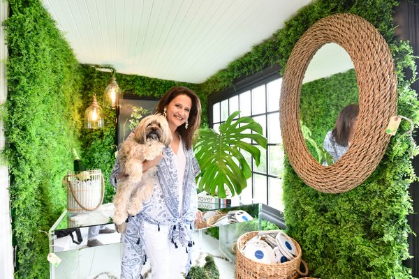 Melanie Roy with her dog, Dune, in her room at the ARF Designer Showhouse.  DANA SHAW