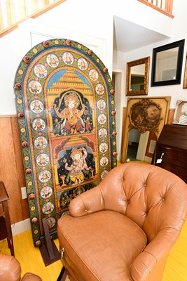 A bit of old India found its way to the benefit sale in the form of a painted Ganesha (Hindu god of transitions) door. Ganesha is often found near or on doors throughout India.  DANA SHAW