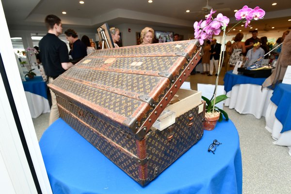 After the furniture sale portion of the event there was a live auction with items like this vintage Louis Vuitton trunk, which had an opening bid of $4,000! DANA SHAW
