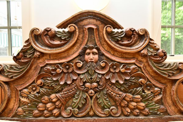 A 19th century carved and painted wood headboard in medieval style purchased in less than three minutes by Greenwald Antiques, Cleveland, Ohio. DANA SHAW