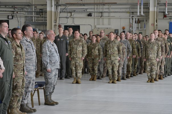 Members of the 106th Rescue Wing gathered Friday morning to celebrate the rollout of the unit's new aircraft. ANISAH ABDULLAH