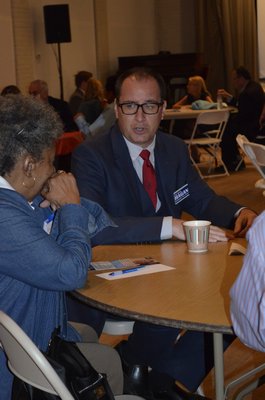 Candidates tested out "speed dating" last week, where they spent 15 minutes with small groups of residents before moving on to the next group. BY ERIN MCKINLEY