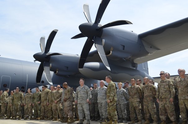 Members of the 106th Rescue Wing with the HC-130J Combat King II aircraft. ANISAH ABDULLAH