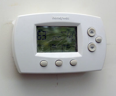 Programable thermostats help regulate the temperature in the house.