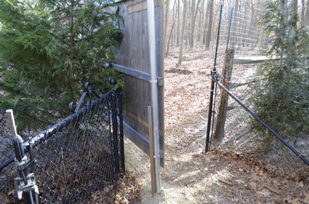 A stockade fence was installed along the southern property line at 91 North Phillips Avenue that impaired the use of the existing fence at 36 Drew Drive, Eastport. ANISAH ABDULLAH