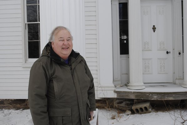 John Eilertsen, executive director of the Bridgehampton Museum, stands outside the Nathaniel Rogers house is expected to reopen in 2019. AMANDA BERNOCCO