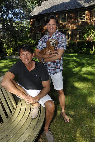 Philip MacGregor, seated, Ron Wendt and Basil outside their Bridgehampton home. MICHELLE TRAURING