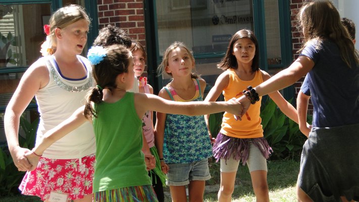 Camp Invention students participate in a team-building exercise in the Springs School courtyard. COLLEEN REYNOLDS