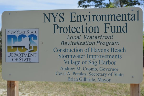 The remediation project at Havens Beach, which will attempt eliminate the stormwater runoff problem that has plagued the bathing beach for years, is in its final stages, with the ditch fully drained and native vegetation to be planted in the coming days. BRANDON B. QUINN PHOTOS