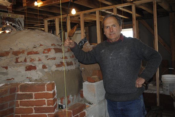 Peter Moore of Pawlet, Vermont is restoring a cooking oven from the 1700s. AMANDA BERNOCCO