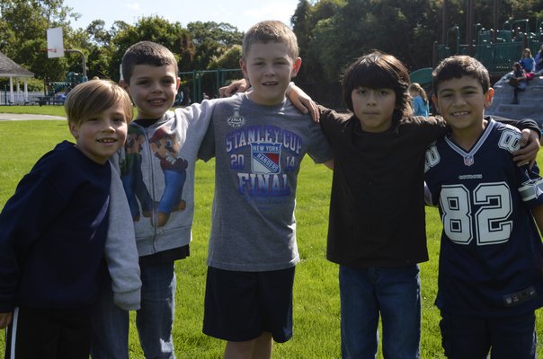 From left, Cole Brewer, Jack Ardito, Riley Miller, Kevin Lemus and Gianni Amodemo wore blue Monday in honor of the national "Stomp Out Bullying" campaign. ALEXA GORMAN