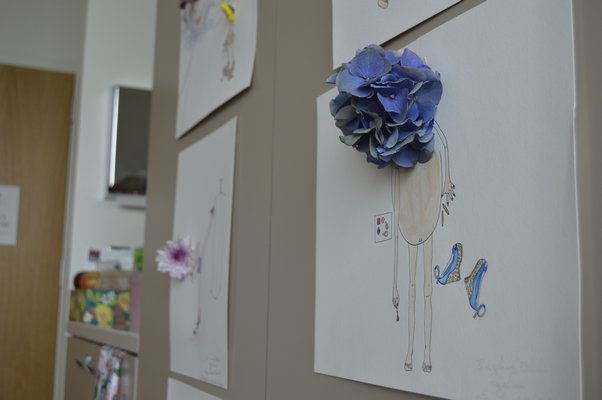 Springs artist Kristen Somody Whalen's gallery of "Flowers With Legs" in her room at Stony Brook University Hospital. ALYSSA MELILLO